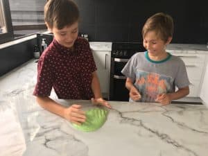 TWO BOYS PLAYING WITH GREEN SLIME IN KITCHEN