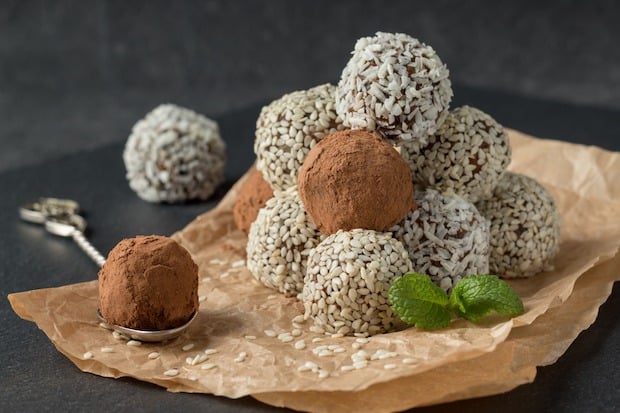 bliss balls with coconut, sesame seeds and chocolate powder. amazing amazeballs