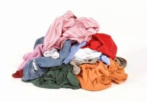 pile of colourful laundry on white background