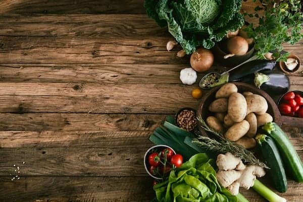 Vegetables on wood. Bio Healthy food, herbs and spices. Organic vegetables on wood