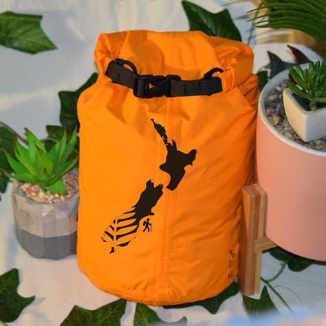 journey bag with plants in background