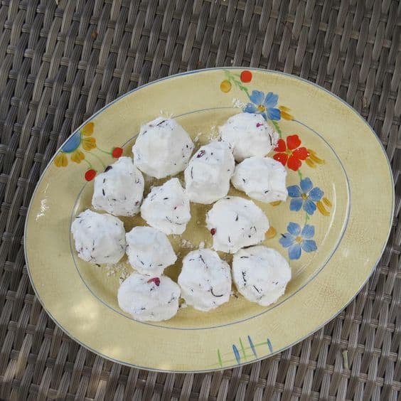 hand made rose petal bath bombs on old fashioned plate